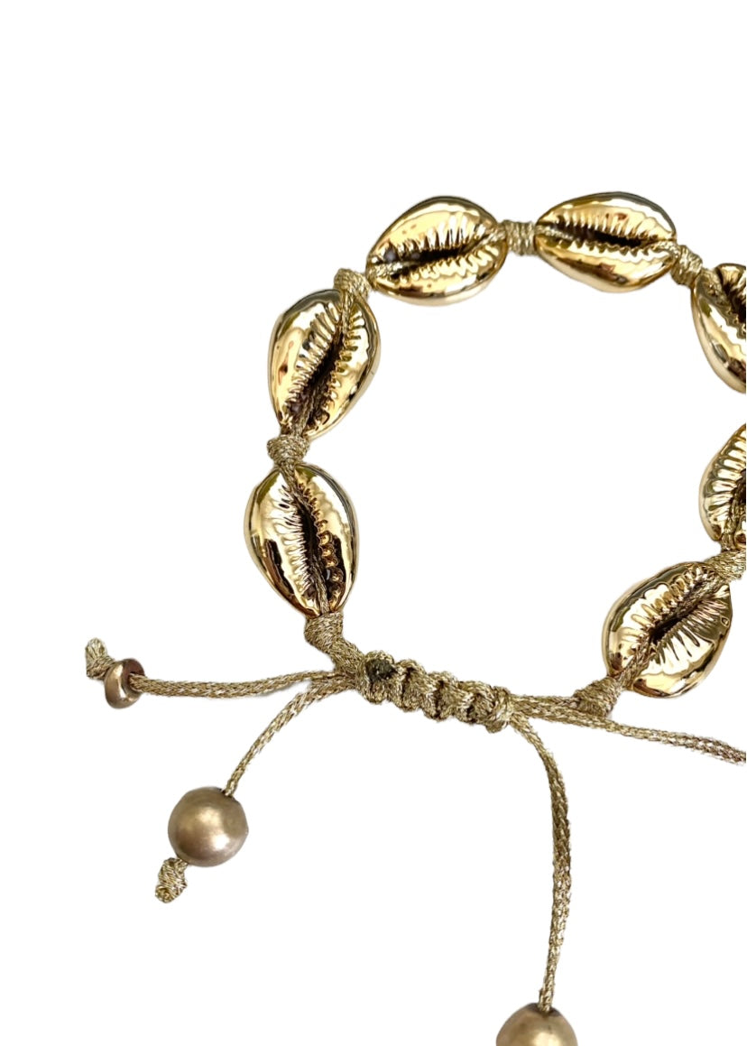 Gold cowrie shell on sale bracelet